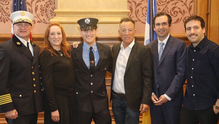 Sam Springsteen (third from left) poses with his parents Patti Scialfa and Bruce Springsteen, Mayor Steven Fulop, and others at City Hall in Jersey City, N.J., Jan. 14, 2020.