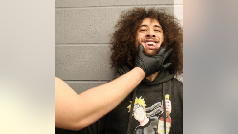 Kawika Crown, 22, charged with Unlawfully Carrying a Weapon.