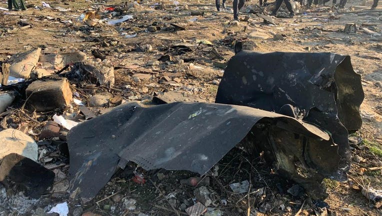 Search and rescue works are conducted at site after a Boeing 737 plane belonging to a Ukrainian airline crashed near Imam Khomeini Airport in Iran just after takeoff with 180 passengers on board in Tehran, Iran on Jan. 8, 2020. (Photo by Fatemeh Bahrami/Anadolu Agency via Getty Images)