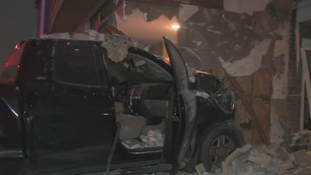 Pickup truck slams into apartment building in SW Houston