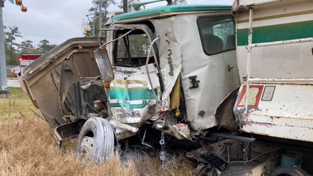 Train crashes into dump truck stuck on railroad tracks in Spring