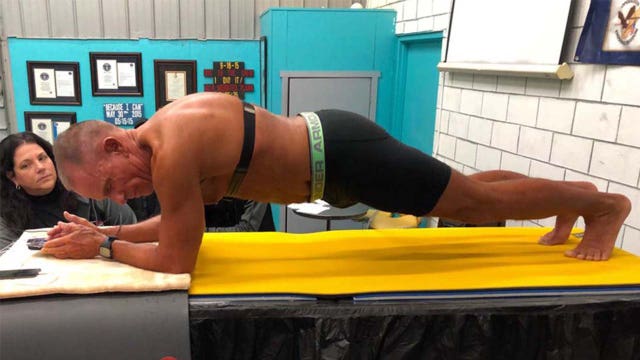 At age 62, retired U.S. Marine holds plank for over 8 hours, breaks world record