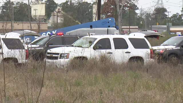 Wrecker driver shot in Spring; SWAT standoff with possible suspect