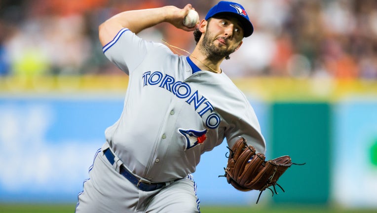 Toronto Blue Jays starting pitcher Mike Bolsinger (49) delivers the pitch in the fourth inning of a MLB game between the Houston Astros and the Toronto Blue Jays at Minute Maid Park, Friday, August 4, 2017. Houston Astros defeated Toronto Blue Jays 16-7.