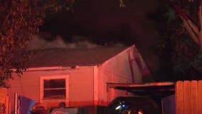 Firefighters rescue man, woman from house fire in the Heights area