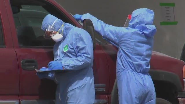 Tensions run high as drivers wait hours to get tested at Houston's first COVID-19 drive-thru