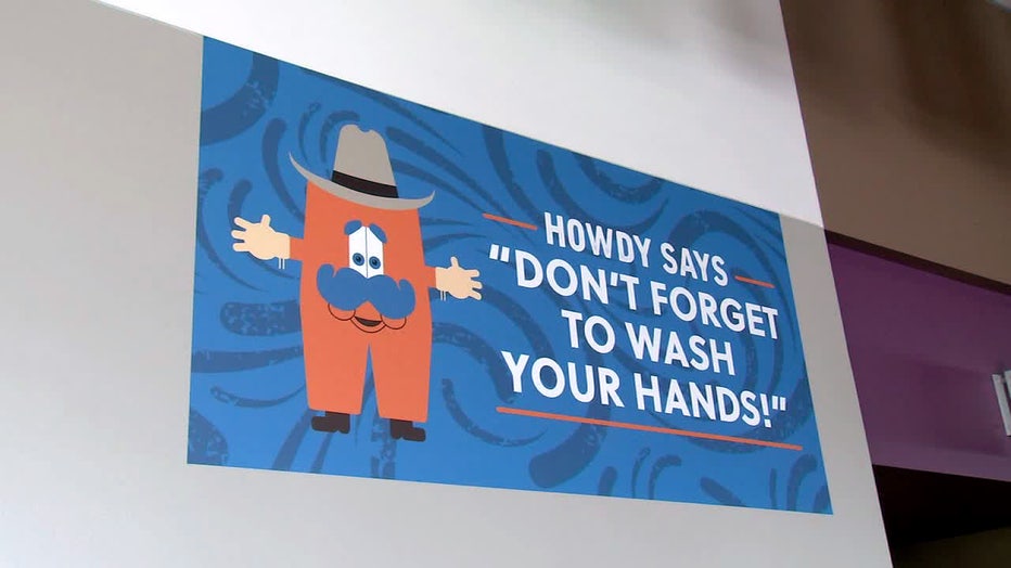 A sign at RodeoHouston reminds visitors to wash their hands.