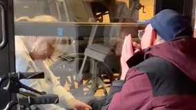 97-year-old WWII vet serenades wife under self isolation with harmonica tune through glass door