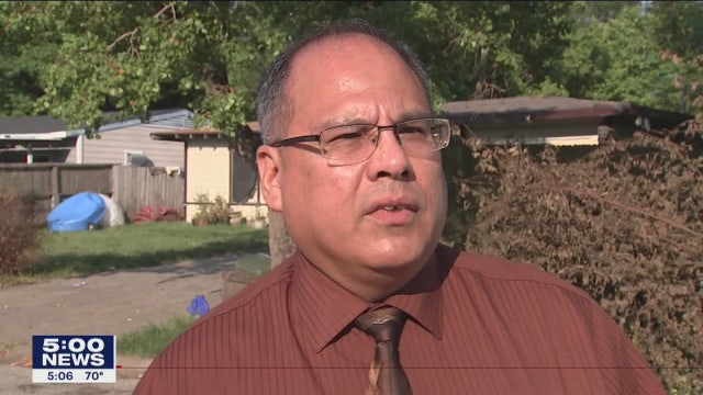 Officers hold prayer for detective critically infected with COVID-19