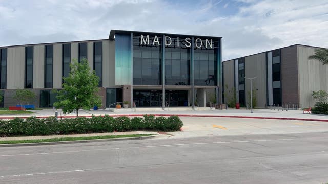 HISD staff member who handed out student laptops has COVID-19