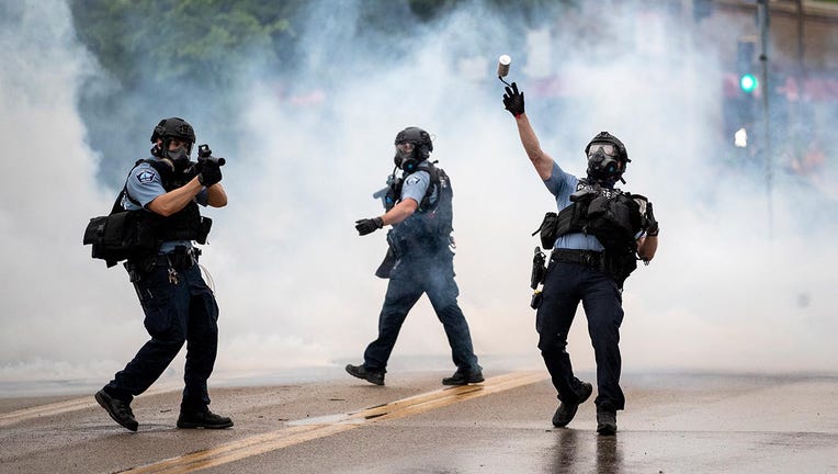 Protesters, officers clash at Minneapolis Police precinct after ...