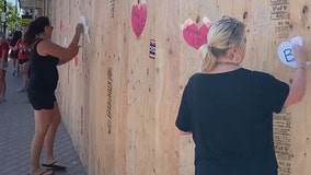 Video shows women ripping down heart-shaped ‘Black Lives Matter’ flyers as teens who posted them cry