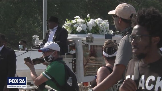 Hundreds line the street to see George Floyd's last mile to final resting place