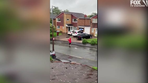 Neighbors start ‘singin’ in the rain’ with socially distanced dance party
