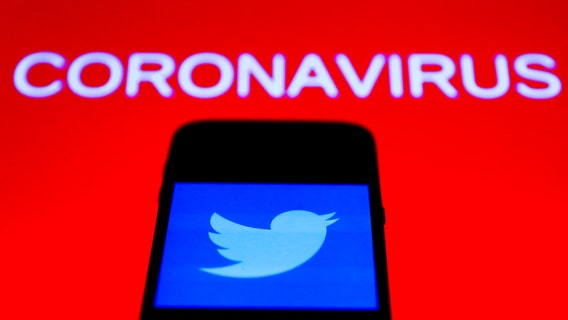 Twitter blocks tweet from an adviser to President Trump downplaying masks