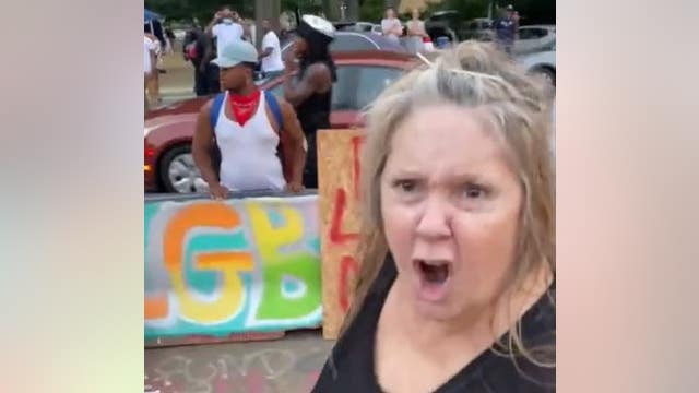 ‘This is my city’: Video captures woman yelling racial slur at George Floyd hologram event