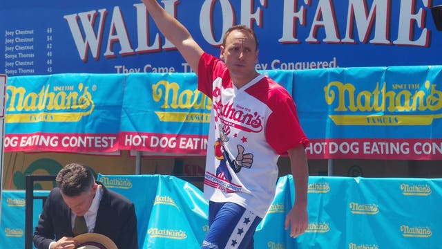 Hot dog champs repeat as NYC marks virus-dampened July 4