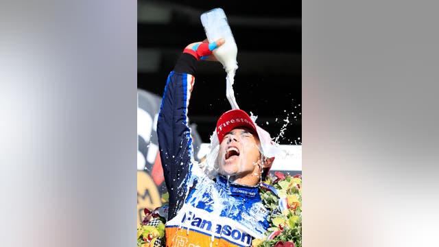 Sato wins 2nd Indianapolis 500 under caution at empty track