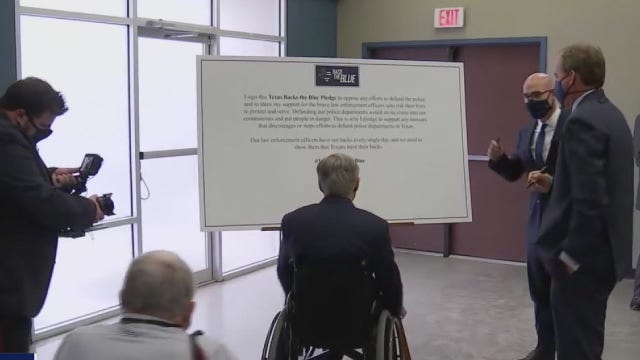 Gov. Abbott signs 'Back the Blue' pledge - What's Your Point?