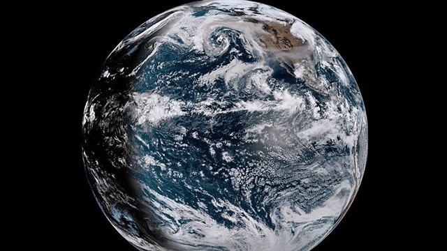 Satellite video shows smoke from West Coast wildfires being pulled into Pacific cyclone