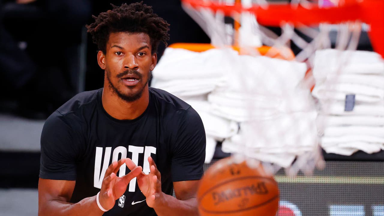 Jimmy Butler of the Miami Heat wears a VOTE shirt and warms up prior  News Photo - Getty Images