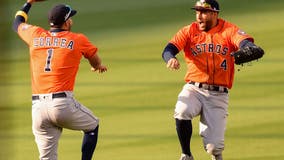 Springer, Correa rally Astros past A's 10-5 in ALDS opener