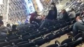 Cardinals fan gets shoved, flies over chairs in football brawl