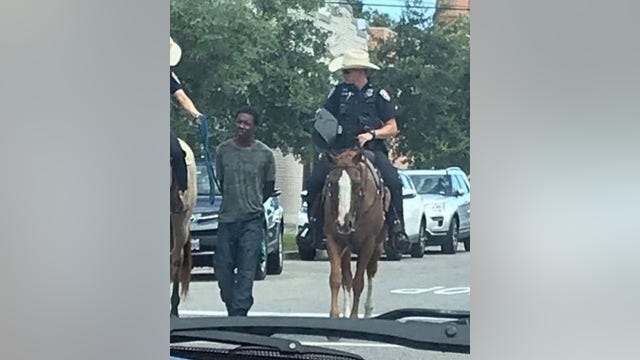 Black man who police led by rope sues city of Galveston for $1M