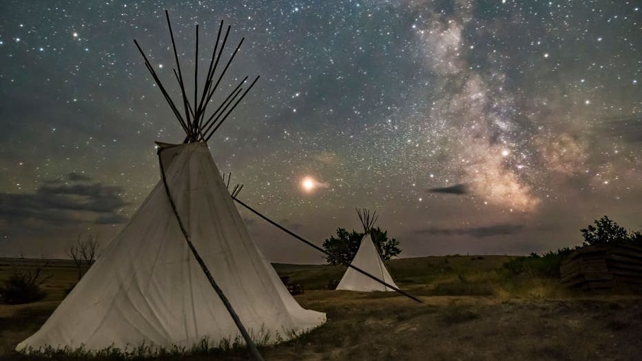 Mars and the Milky Way over the tipis at Two Trees area in Grasslands National Park