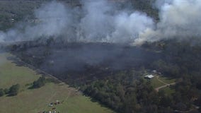 Crews battle wildfire off CR 3810 in Liberty County