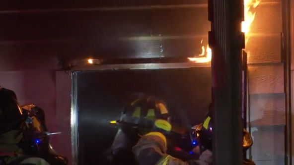 First responders work to put out overnight house fire in north Houston