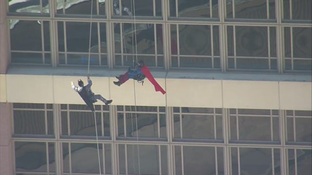 Superheroes surprise young patients at Houston's MD Anderson Cancer Center