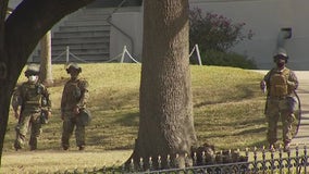 Armed DPS guards pepper lawn of Texas State Capitol during closure