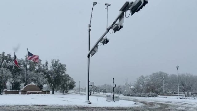 Snow falls in cities north of Houston on Sunday