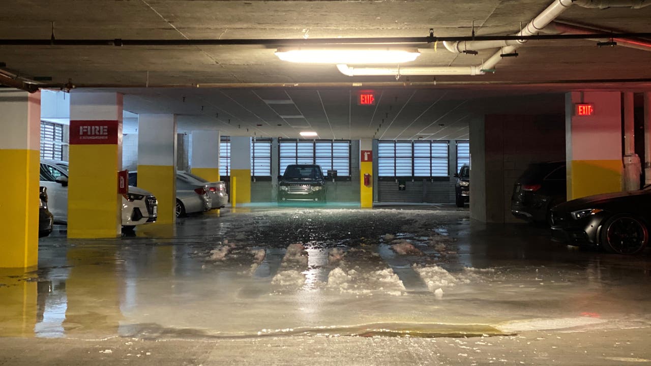 Pipes burst, flood Uptown Dallas apartment parking garage