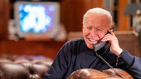 President Joe Biden chats with troops overseas watching the Super Bowl