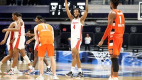 Houston locks in on defense, beats Syracuse 62-46 in NCAAs