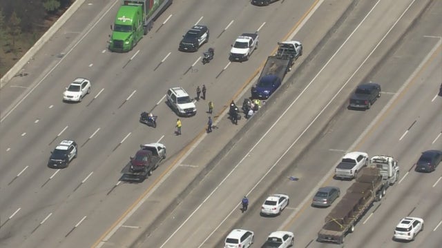 Driver detained after crash with Metro PD motorcycle, another vehicle