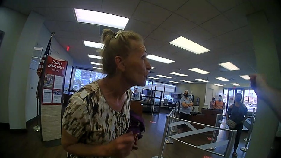 Woman arrested at Galveston bank after refusing to wear mask, resisting  arrest