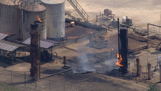 Industrial fire near Magnolia is 'contained' and 'under control', officials say