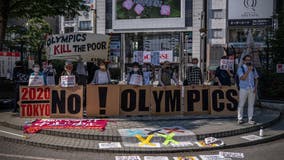 IOC VP faces backlash for saying Tokyo Olympics are on despite pandemic