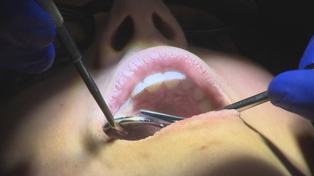 Researchers believe gum disease could be causing severe symptoms of COVID-19