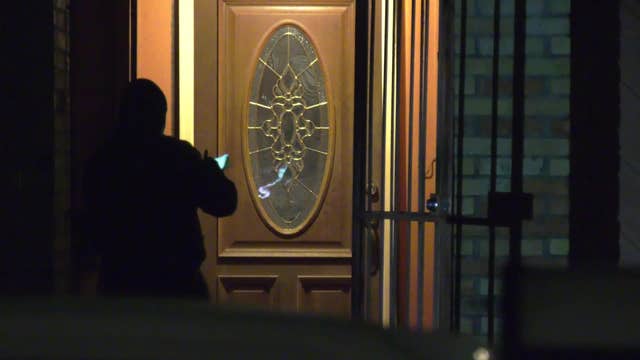 Police find body wrapped in tarp in living room of Houston home