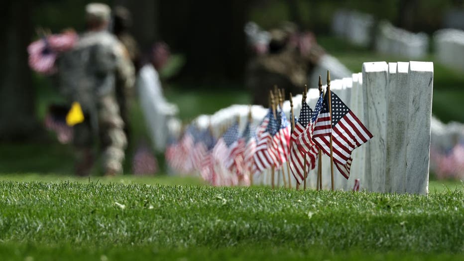 14ca737f-Arlington National Cemetery Holds Annual Flags-In To Honor Fallen For Memorial Day