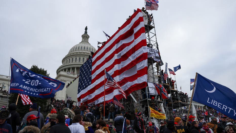 dac238ea-Trump supporters storm Capitol building in Washington
