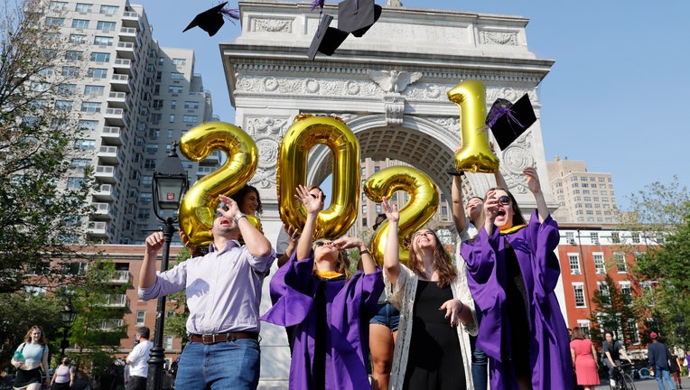 Students Celebrate Graduation At Washington Square Park