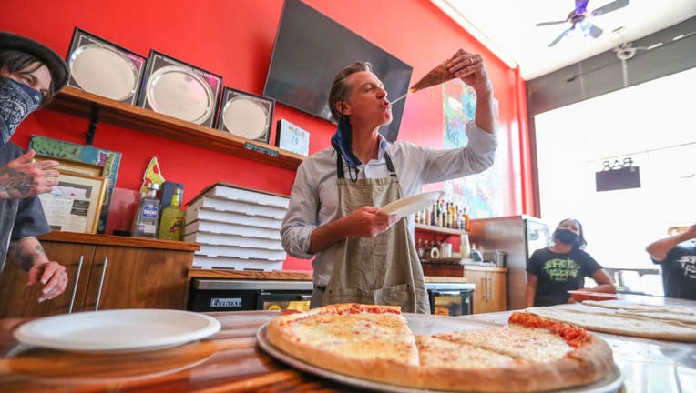 9c69fddf-California Governor Gavin Newsom visits small businesses