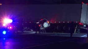 Driver, passenger trapped inside SUV after crashing into 18-wheeler in Baytown