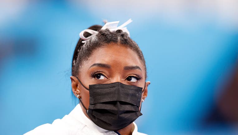 TOKYO, JAPAN - JULY 27: Simone Biles of Team United States looks on during the Women's Team Final on day four of the Tokyo 2020 Olympic Games at Ariake Gymnastics Centre on July 27, 2021, in Tokyo, Japan. (Photo by Fred Lee/Getty Images)