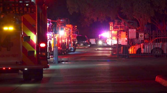 Woman, child rescued from fire after boyfriend allegedly locked them in room